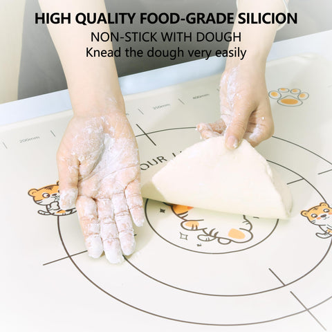 COOKSTYLE measuring mat with edge height contains liquids during kneading.