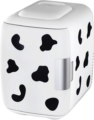 Cooluli 4L cow-print mini fridge on a bedroom shelf for skincare and beverages.