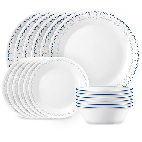 Corelle Caspian dinner plates with navy trim, lightweight for easy daily handling.