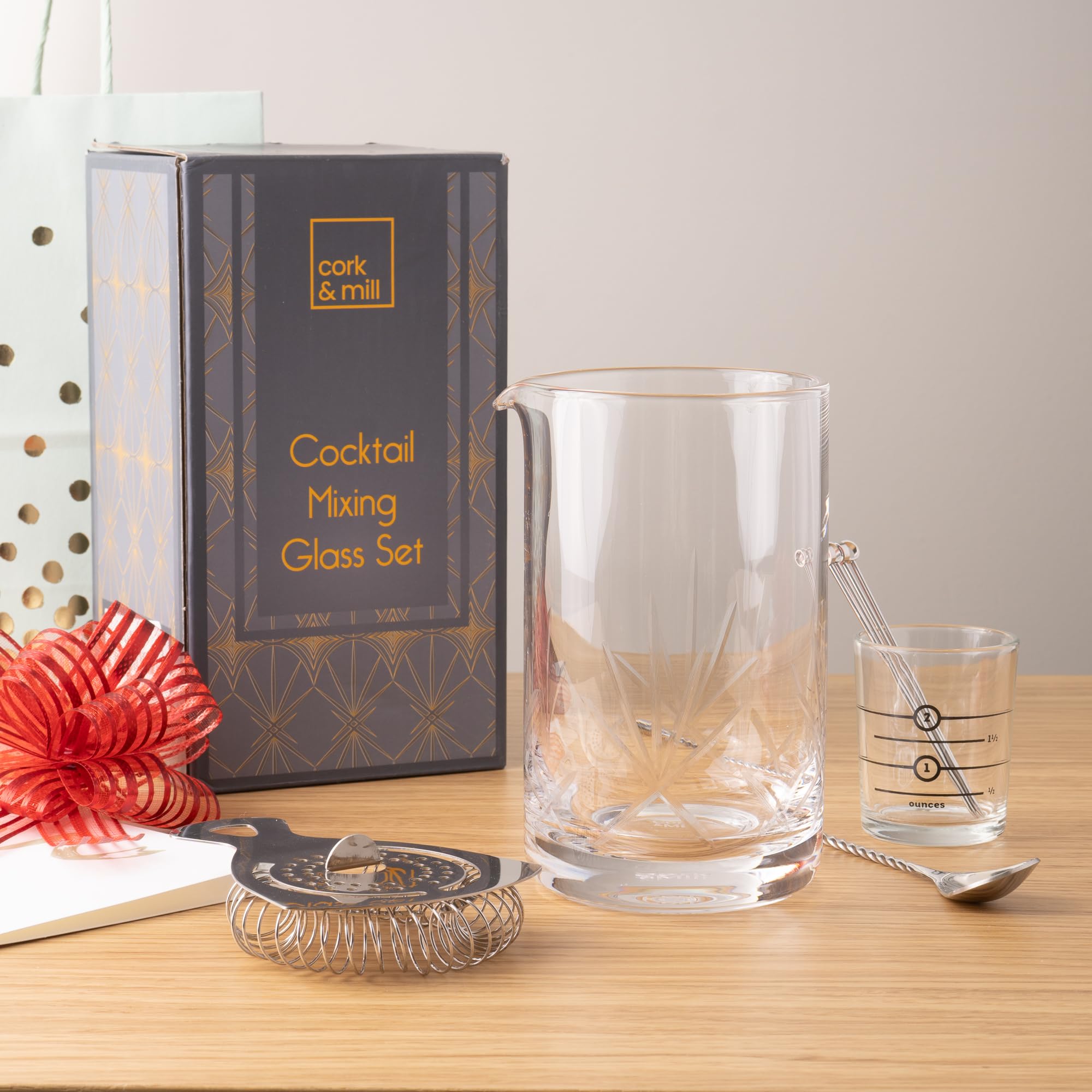 Cork & Mill 2 oz jigger with half-ounce marks for accurate measurements.