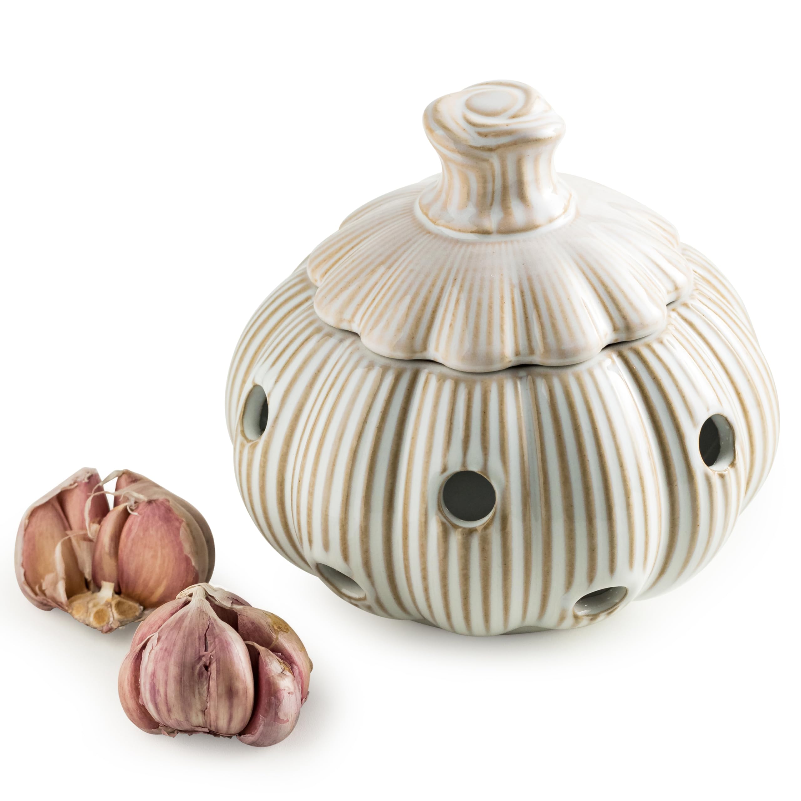 Cormomu ceramic garlic keeper with lid on kitchen counter adds whimsical decor while storing bulbs.