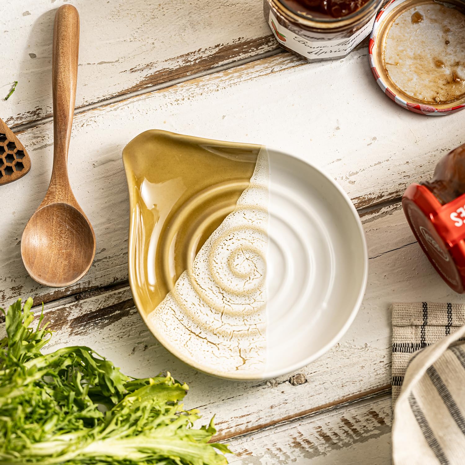 Cormomu gradient brown spoon rest on counter adds subtle kitchen decor.