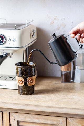 Cormomu optimized drink opening supports controlled, spill-free sips