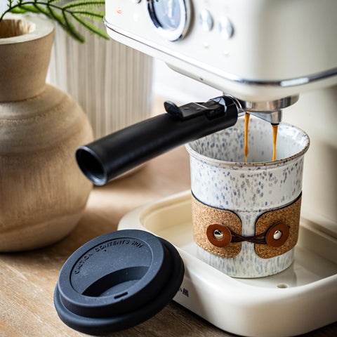 Cormomu spill-proof lid designed to prevent leaks during transit