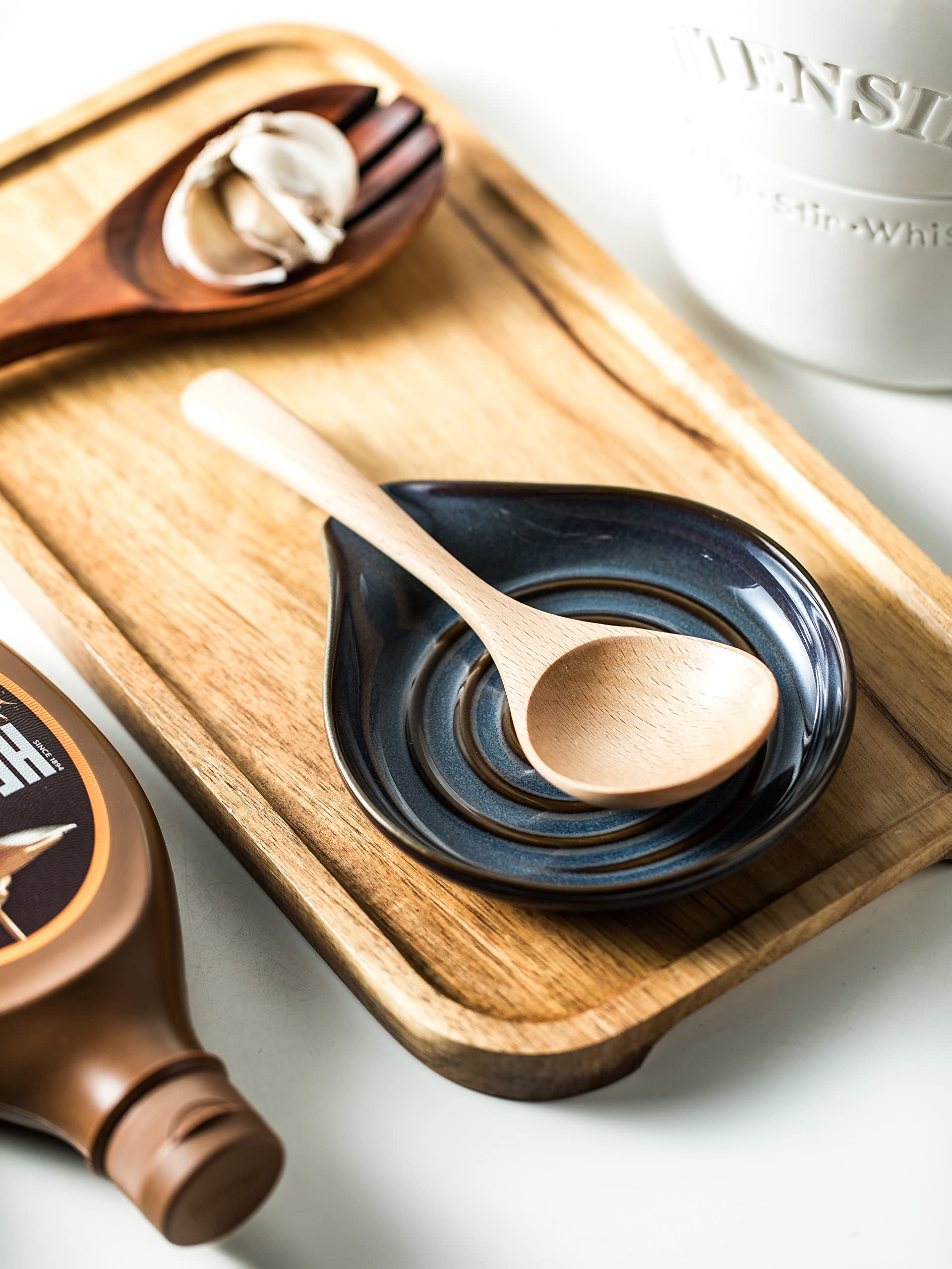 Cormomu spoon holder organizes utensils and small items on a countertop.