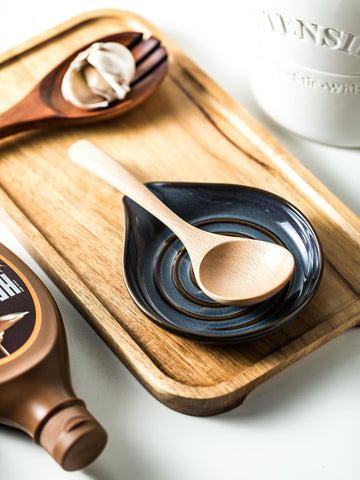 Cormomu spoon holder organizes utensils and small items on a countertop.