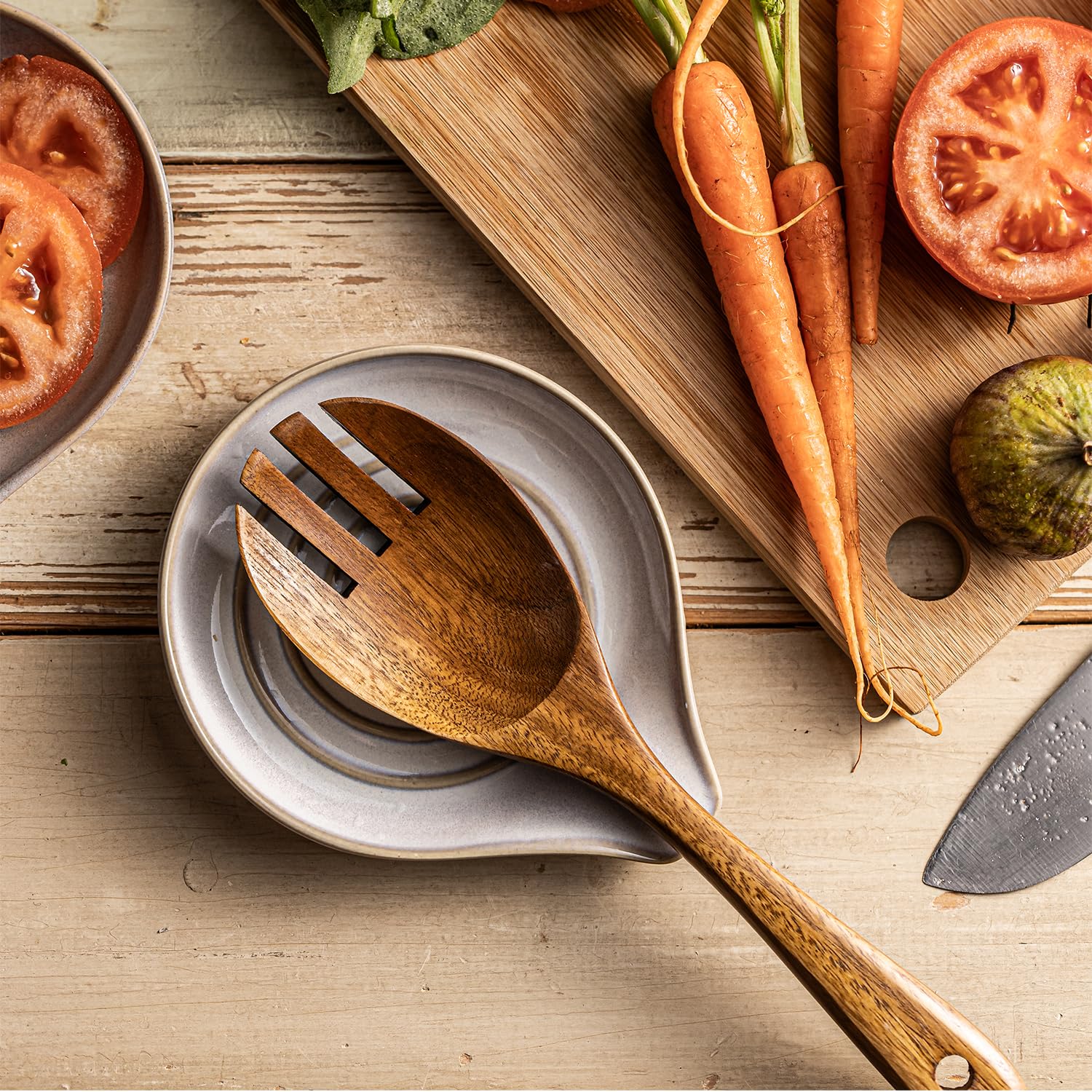Cormomu spoon rest helps organize utensils on kitchen counter