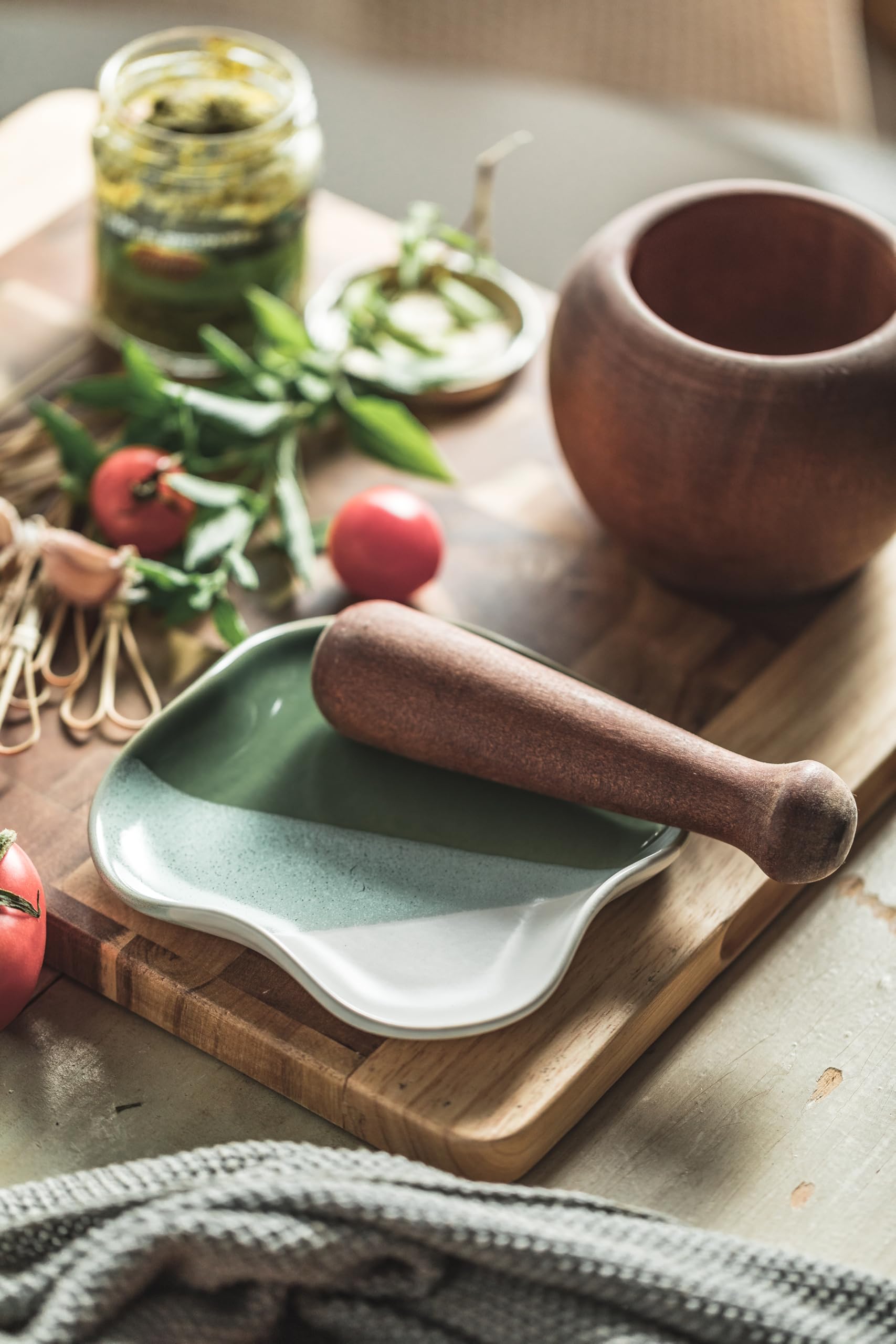 Cormomu utensil rest keeps spatulas within reach and organized.