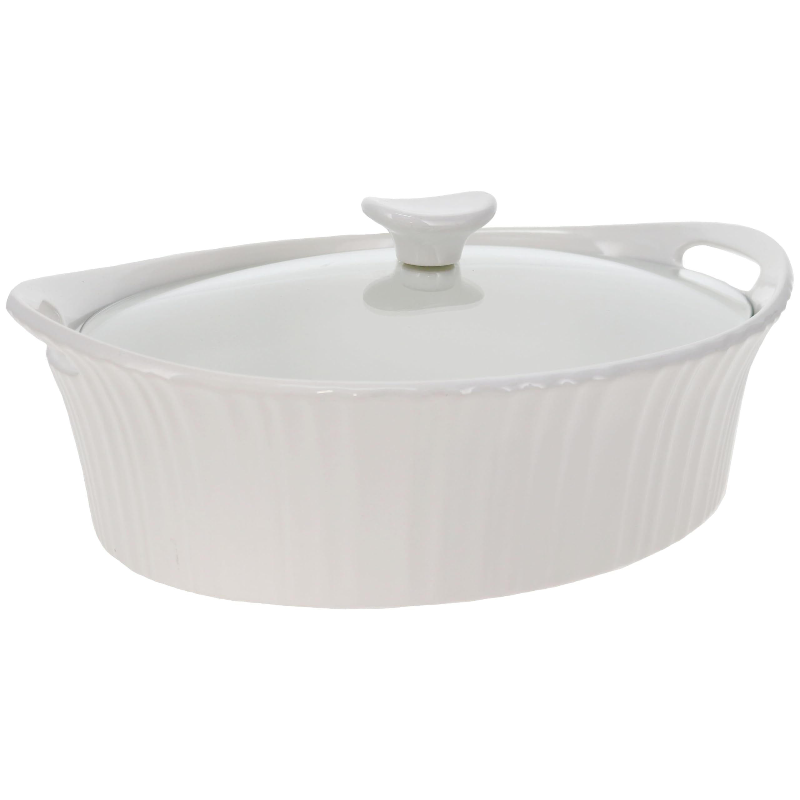 CorningWare French White oval casserole on table ready for serving.