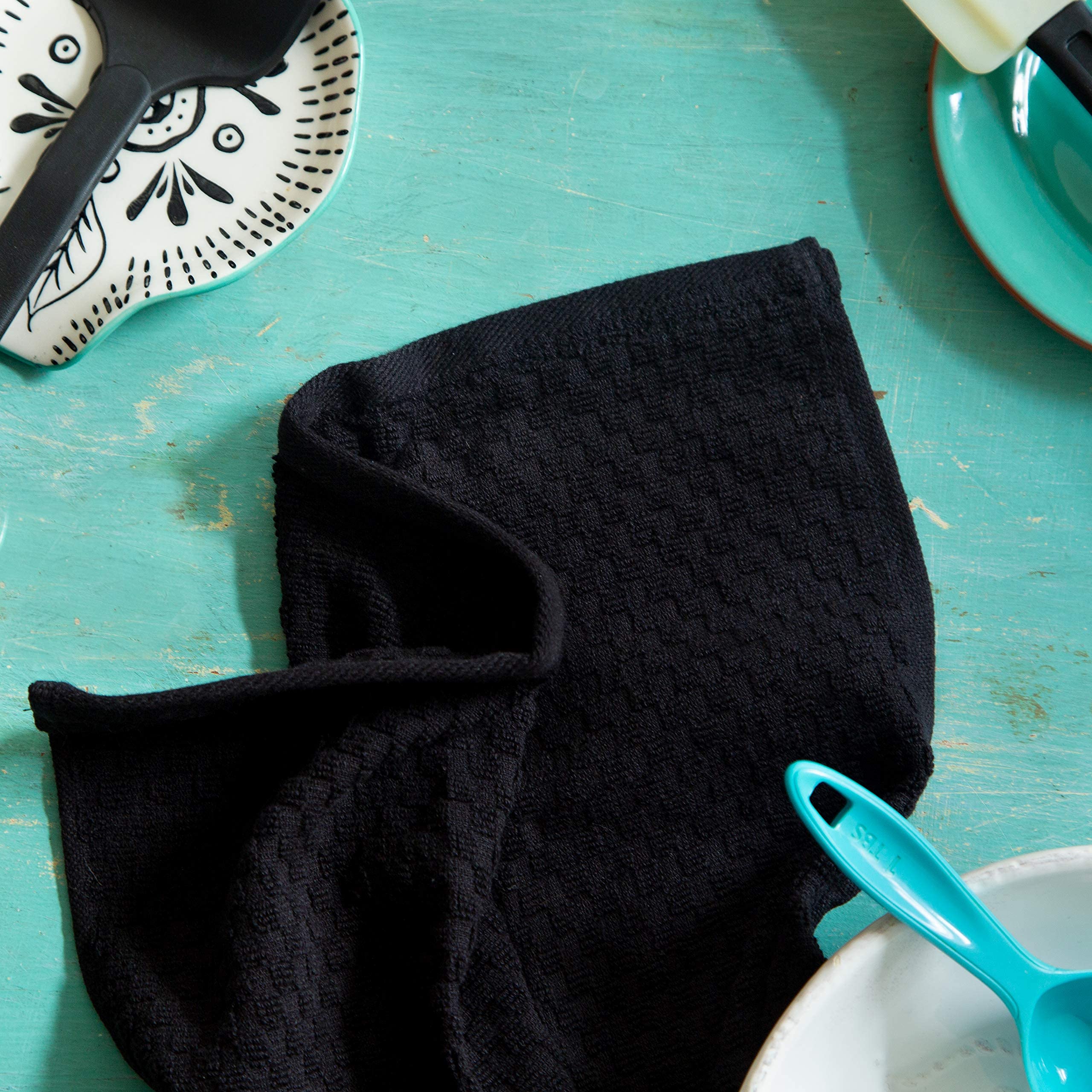 Cotton Craft Euro Cafe towel 2-ply cotton ensures durability during tasks.