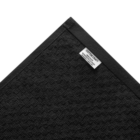 Cotton Craft Euro Cafe towel adds a chic kitchen decor touch in black.