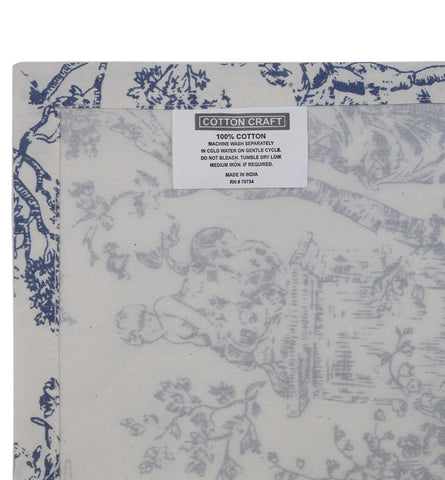 COTTON CRAFT table setting showcases navy toile napkins for holidays.