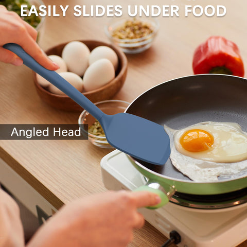 Coukre high-heat silicone spatula for safe sautéing on hot pans.