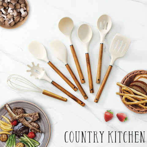 Country Kitchen whisk with wood handle for whipping and aeration.