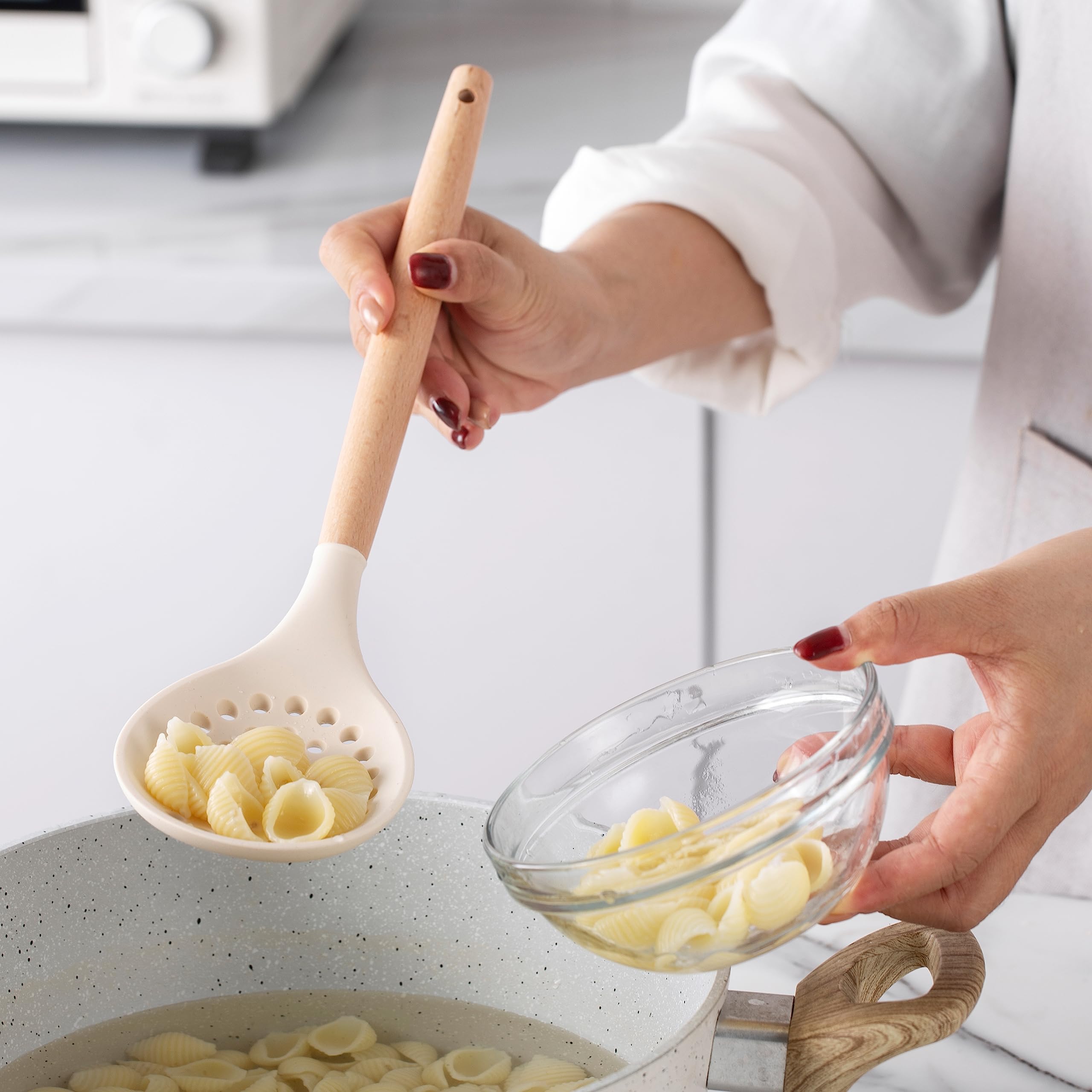 Country Kitchen utensil holder helps keep counters organized.