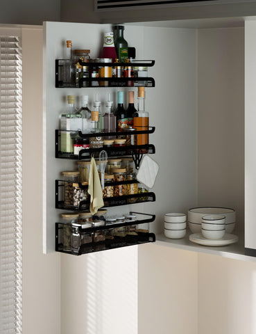 Couwilson spice rack used in the kitchen to streamline spice storage.