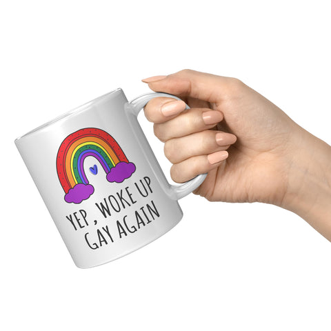 Coveted Goods Yep Woke Up Gay Again design closeup highlights rainbow heart graphic and bold text.