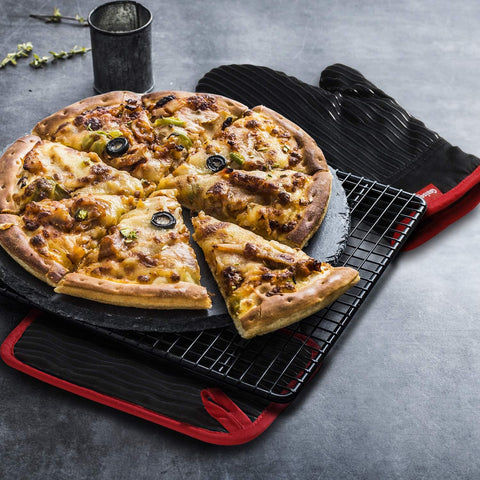 Coziselect heat-resistant mitts protect hands and forearms during cooking.