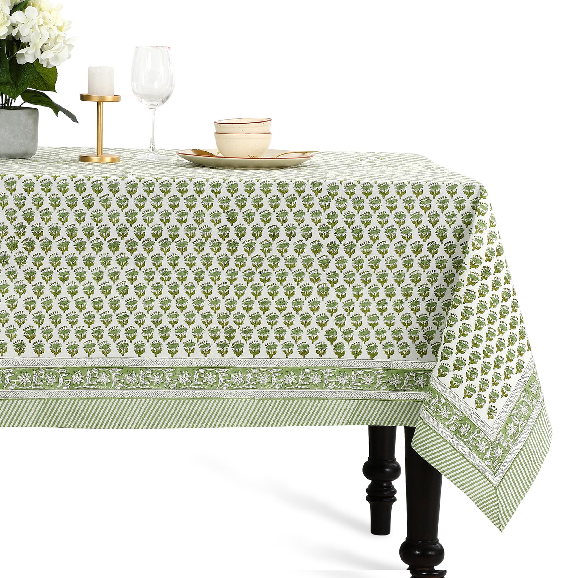 CPC Cotton Print Club emerald green tablecloth on a dining table for elegant gatherings.