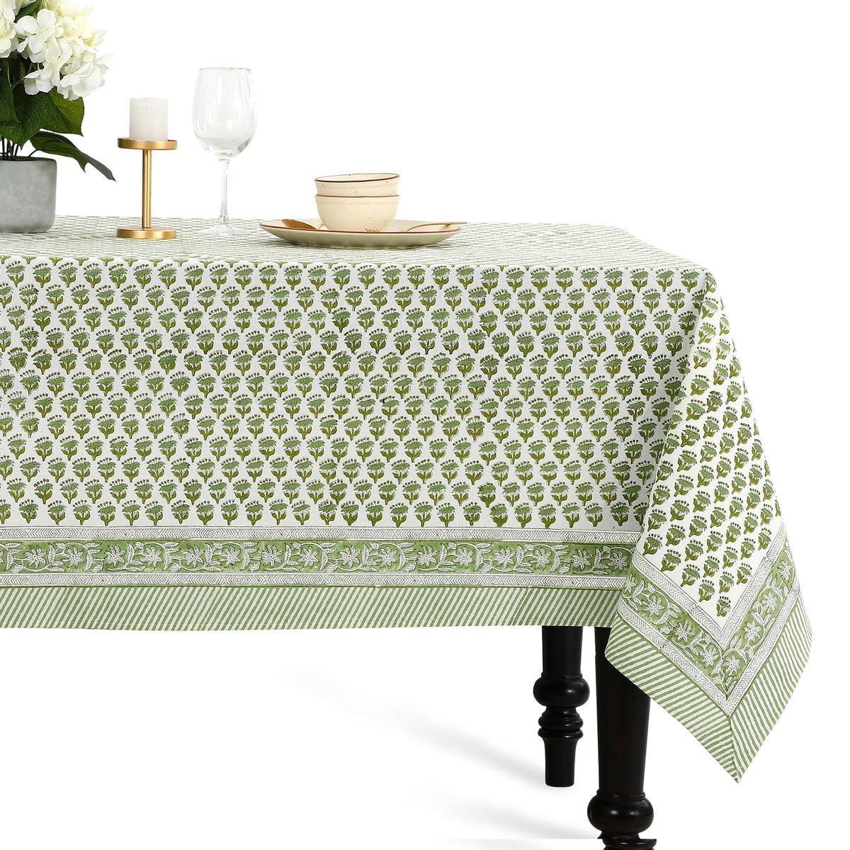 CPC Cotton Print Club emerald green tablecloth on a dining table for elegant gatherings.