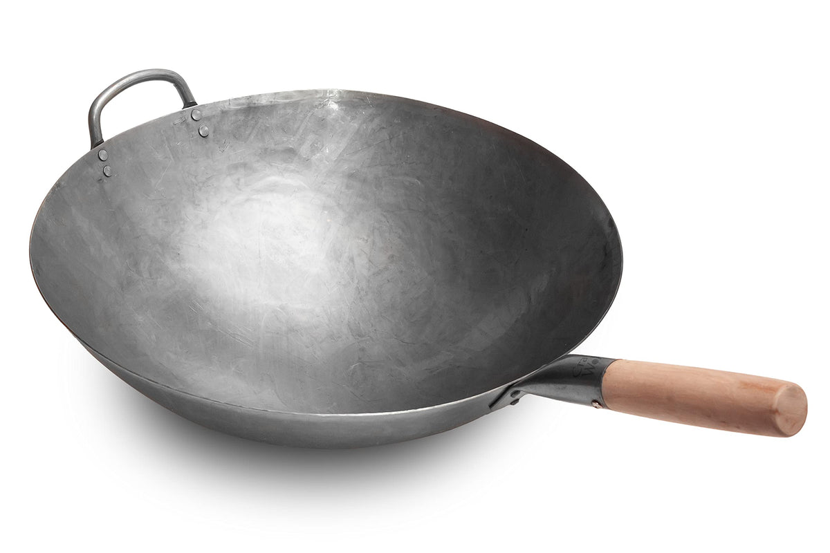 Craft Wok Big 16 Inch hammered carbon steel with wooden and steel helper handle, ideal for high-heat stir-frying.