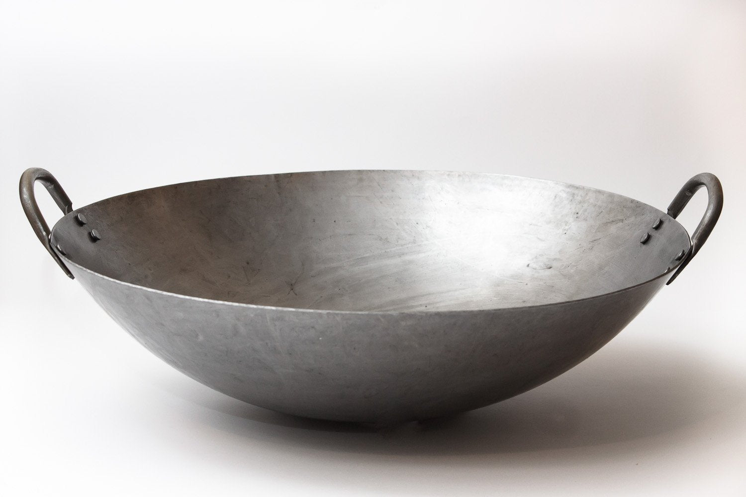 Craft Wok carbon-steel 15-gauge 16-inch pan for fast searing.