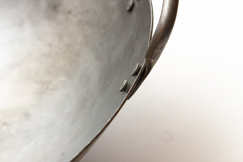 Craft Wok round-bottom hand-hammered wok for professional kitchen results.