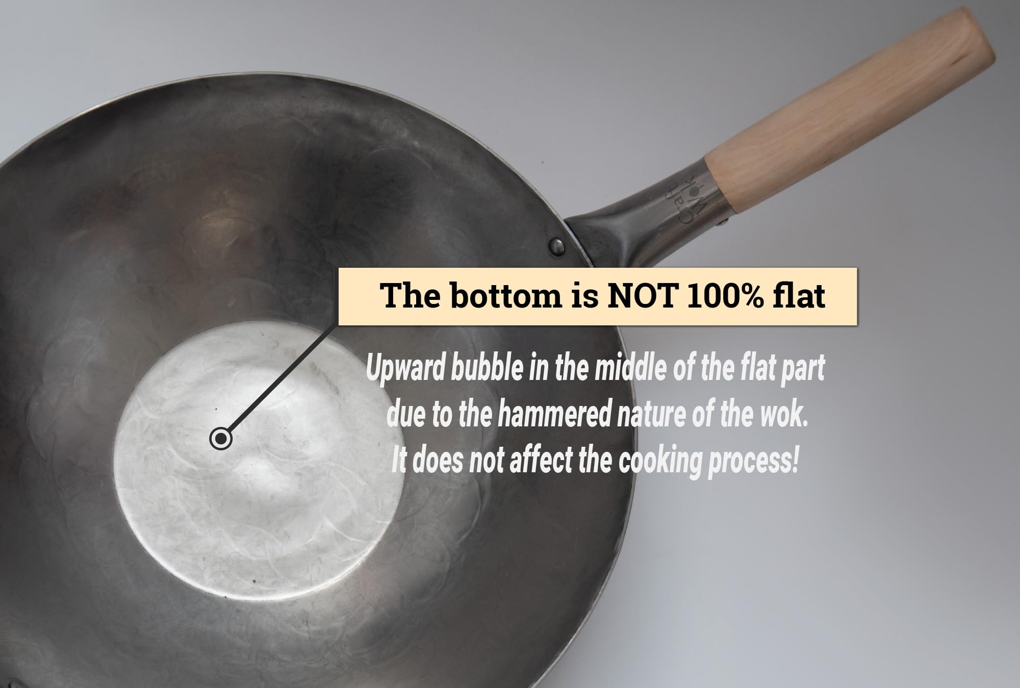 Craft Wok steel helper handle stays cool during high-heat cooking.