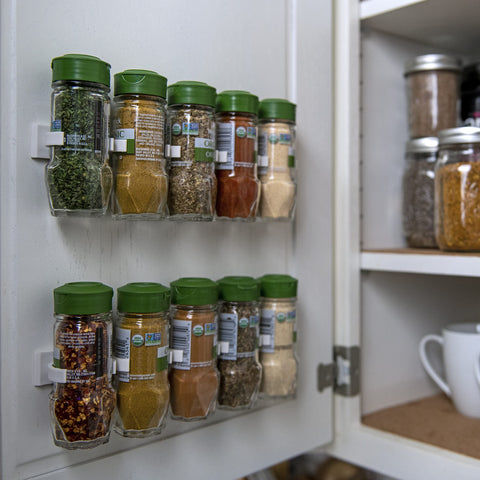 Crazy Chef adhesive mount secures jars to a cabinet surface.