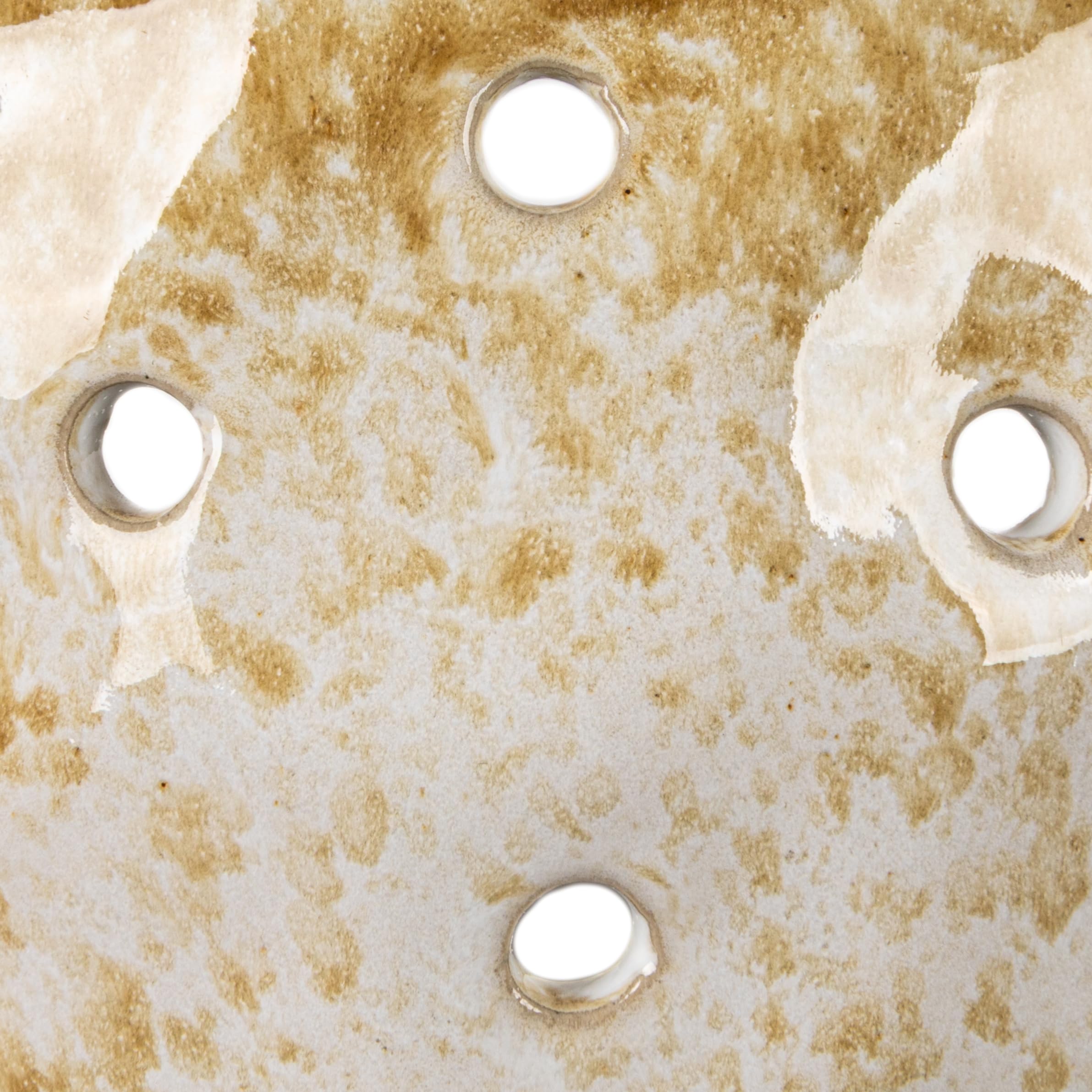 Creative Co-Op beige stoneware colanders displayed on a bar cart