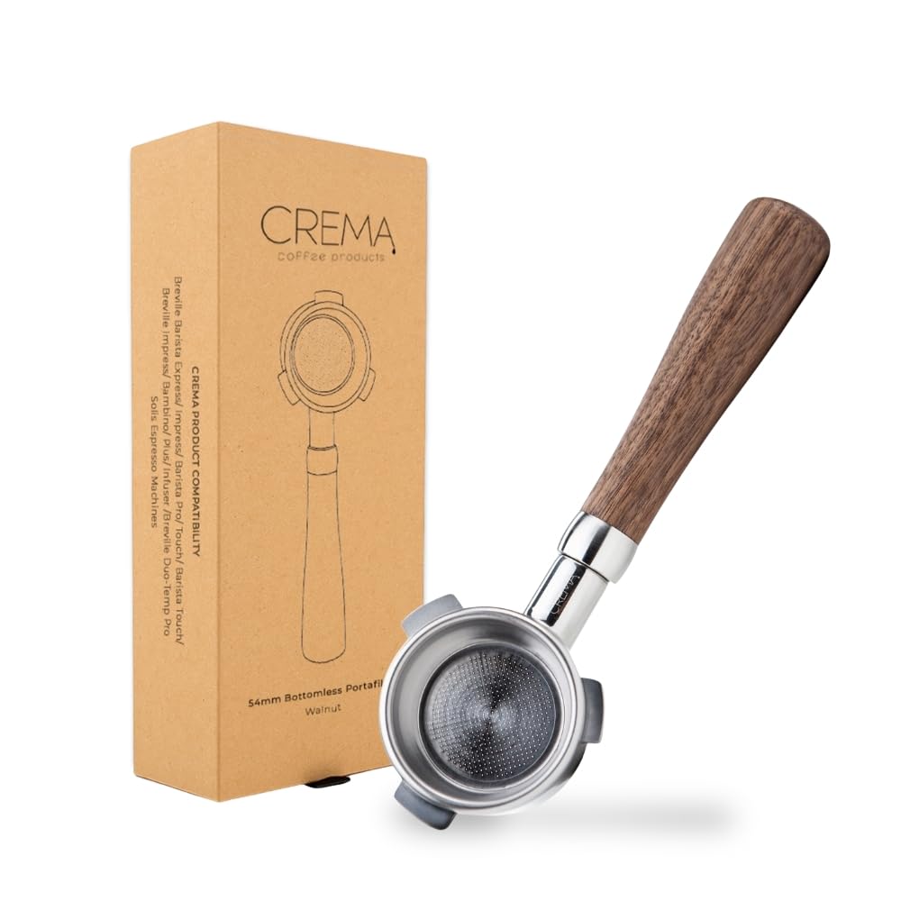 Crema 54mm bottomless naked portafilter pours espresso with visible crema.