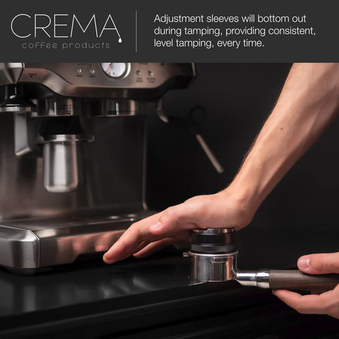 CREMA double-sided espresso tool in use, balanced feel.