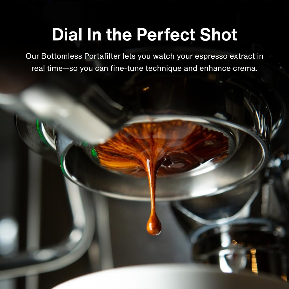 Crema portafilter ergonomic handle enables comfortable, controlled tamping.