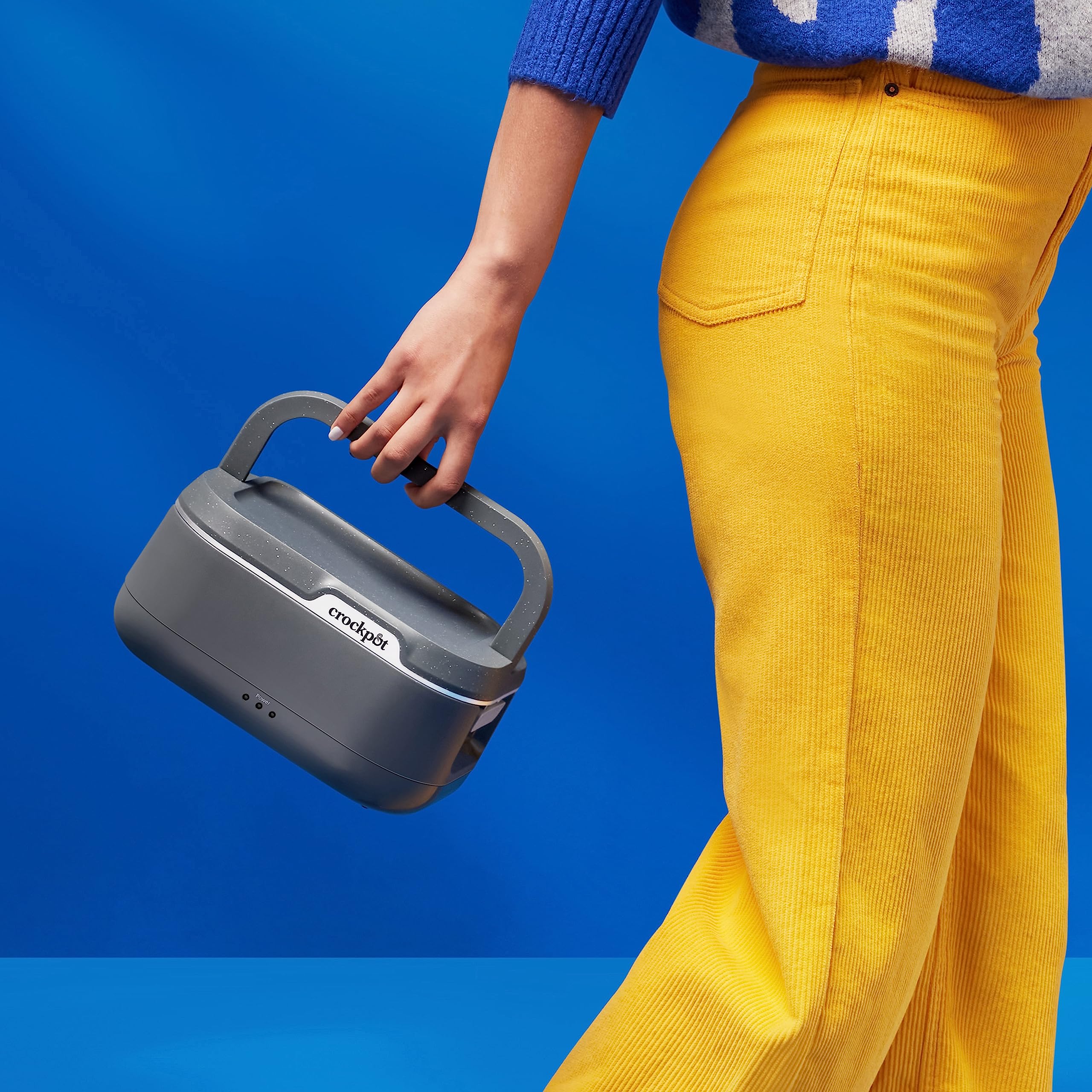 Crock-Pot GO lid with steam-release valve prevents spills during transit.