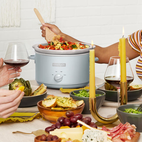 Crock-Pot Macaroon Blue near kitchen counter highlighting 4.5-quart capacity