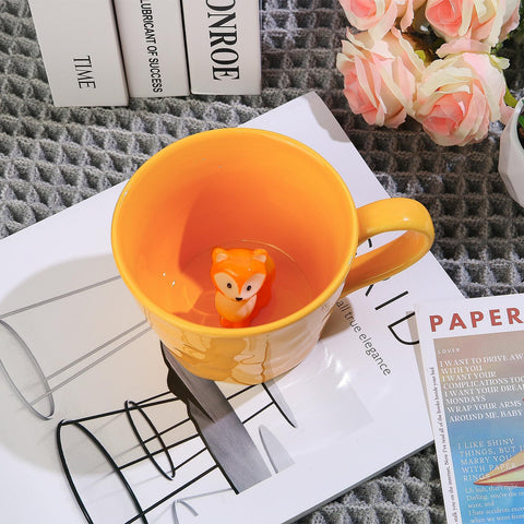 Cteaffee bottom-reveal-fox-mug features a fox peeking at the end of your sip.