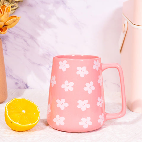 Cteaffee pink mug in use with coffee showing generous capacity