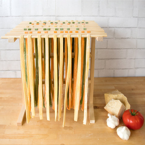 CucinaPro drying rack shows removable dowels for easy cleaning and flexible drying.