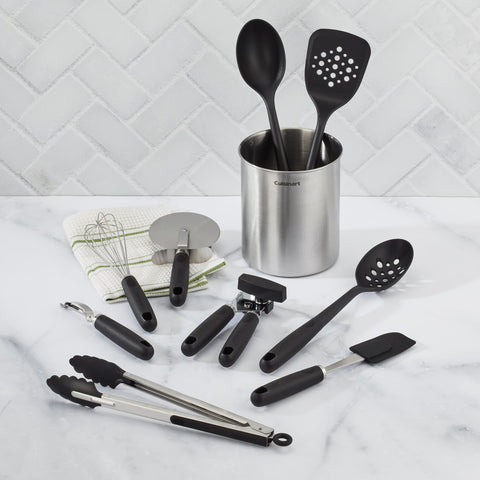 Cuisinart slotted turner in crock, ideal for flipping without scratching nonstick pans.