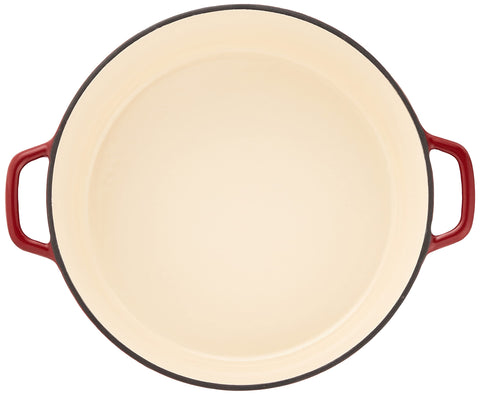 Cuisinart Chef's Classic enameled cast iron round casserole on stovetop, versatile from searing to simmering.