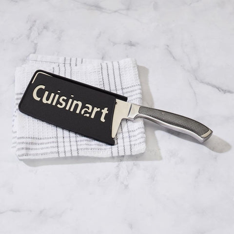 Cuisinart C77SS-CLV cleaver handling tough vegetables and bones in kitchen.