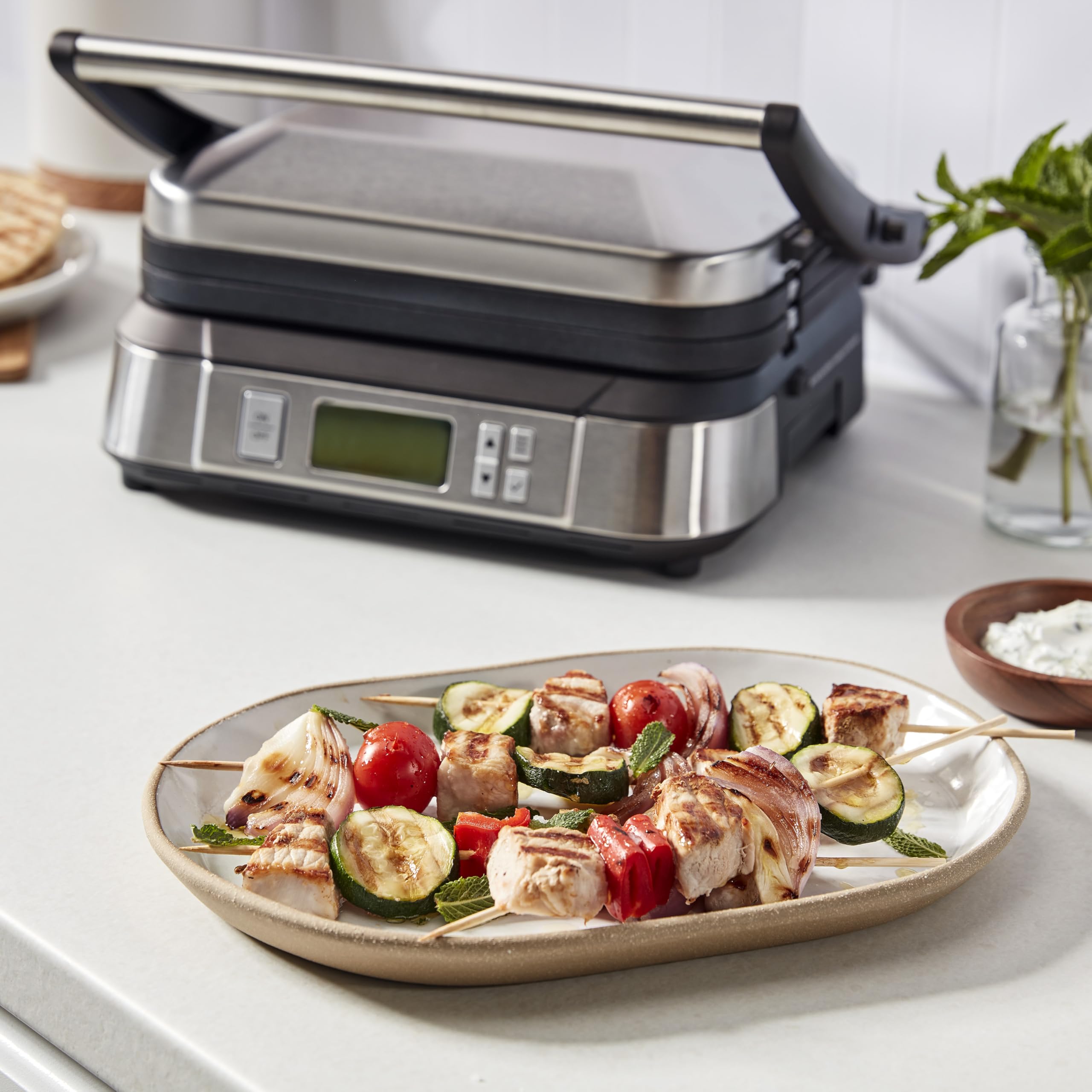Cuisinart Griddler opens flat to cook up to eight burgers at once