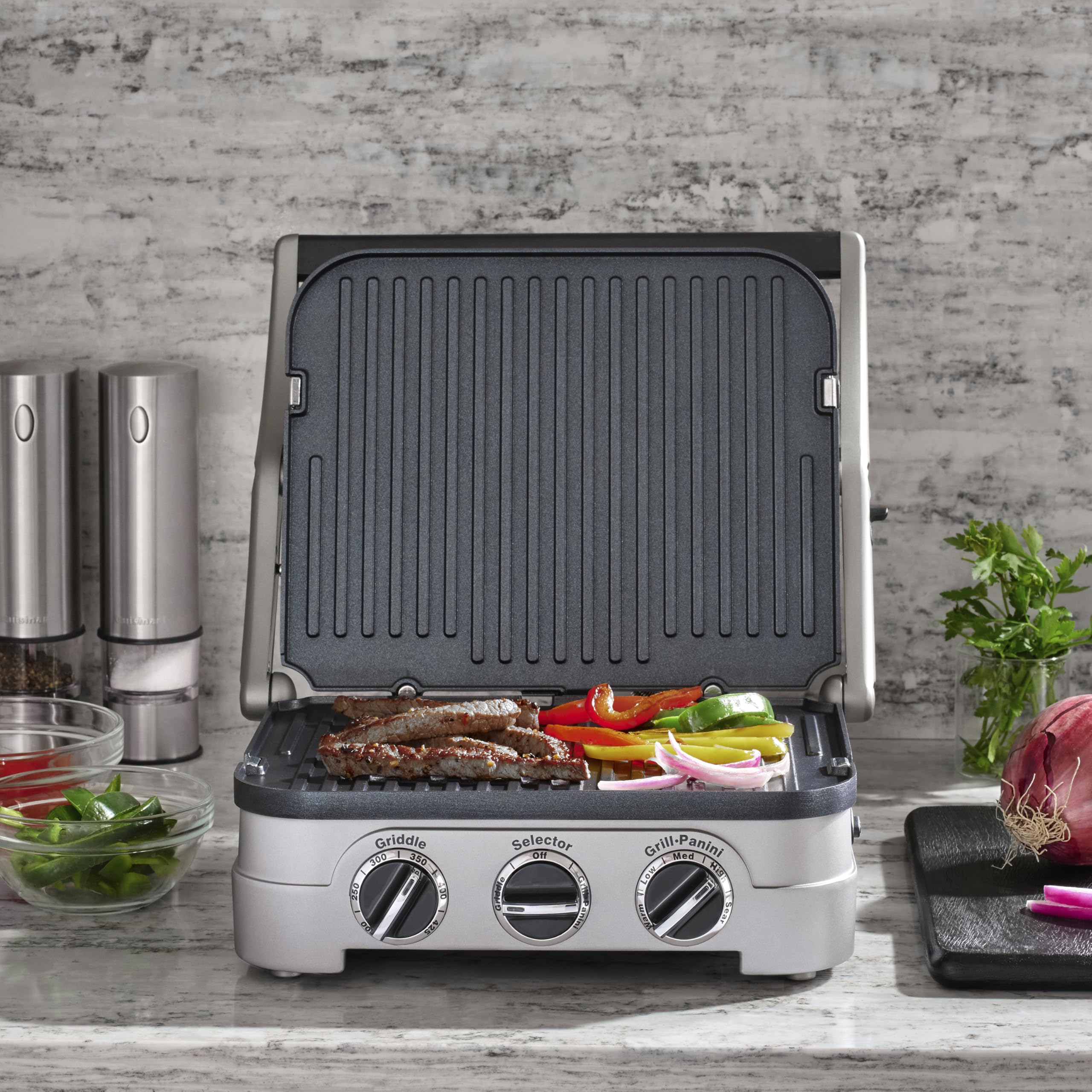 Cuisinart Griddler reversible plates for grill and griddle surfaces in one unit.