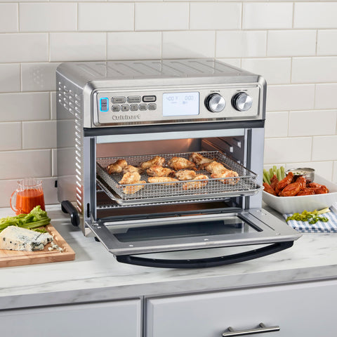 Cuisinart TOA-95NAS inside view reveals 0.95 cu ft capacity for multiple dishes