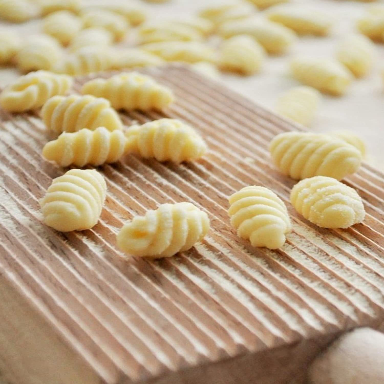 Cuisinox cavatelli board ridges help define texture on pasta.