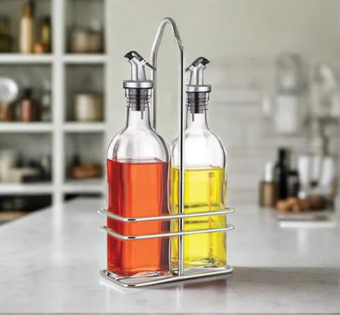 Close-up of dripless swivel spouts on Cuisinox bottles for precise pouring.