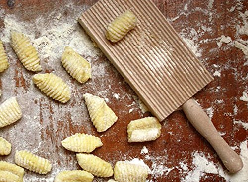 Cuisinox grooved board creates grooved butter balls for serving.
