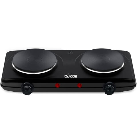 CUKOR double burner front view shows compact two-burner setup in a small kitchen.