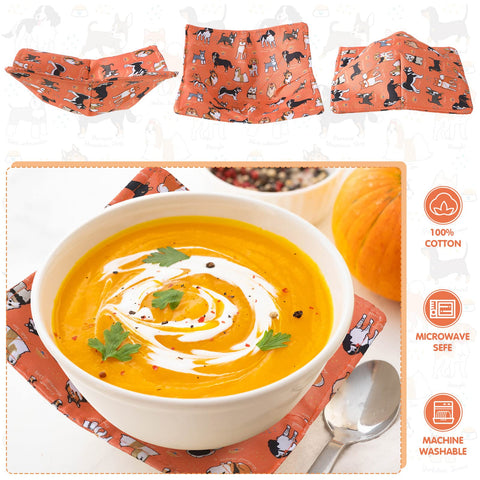 Cunhill orange dog-pattern bowl cozy in use protects hands