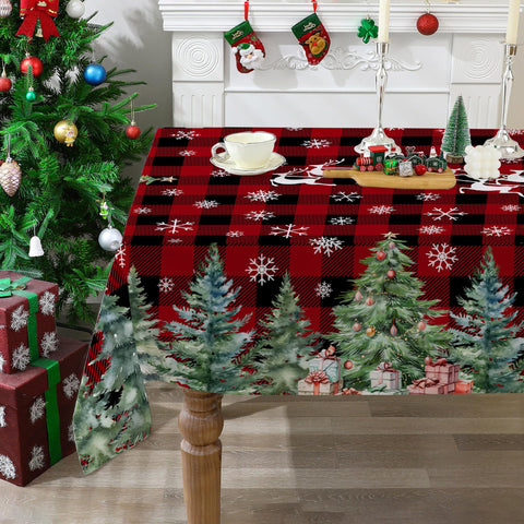Cusugbaso Christmas tablecloth on a red buffalo plaid dining table, festive and protective.
